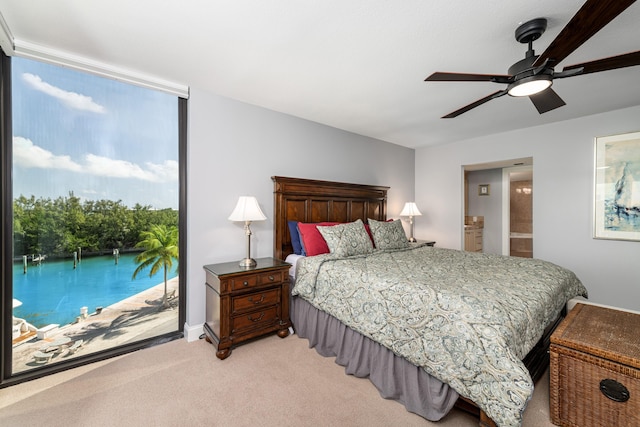 6301 Gulf Of Mexico Blvd Unit 301, Marathon, FL 33050 - carpeted bedroom with access to outside, ceiling fan, and expansive windows