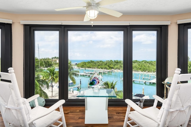 6301 Gulf Of Mexico Blvd Unit 301, Marathon, FL 33050 - entryway featuring a water view, plenty of natural light, and dark wood-style flooring