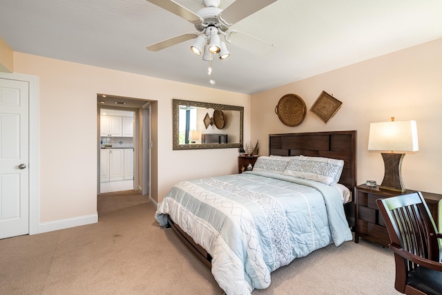 6301 Gulf Of Mexico Blvd Unit 301, Marathon, FL 33050 - bedroom with light colored carpet, ceiling fan, and baseboards