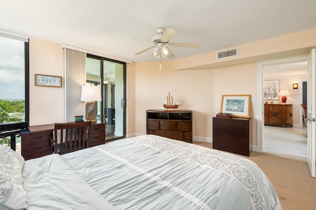 6301 Gulf Of Mexico Blvd Unit 301, Marathon, FL 33050 - bedroom featuring light carpet, multiple windows, visible vents, and baseboards