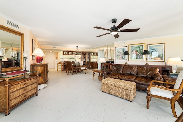 6301 Gulf Of Mexico Blvd Unit 301, Marathon, FL 33050 - living area featuring a ceiling fan, visible vents, crown molding, and light tile patterned floors