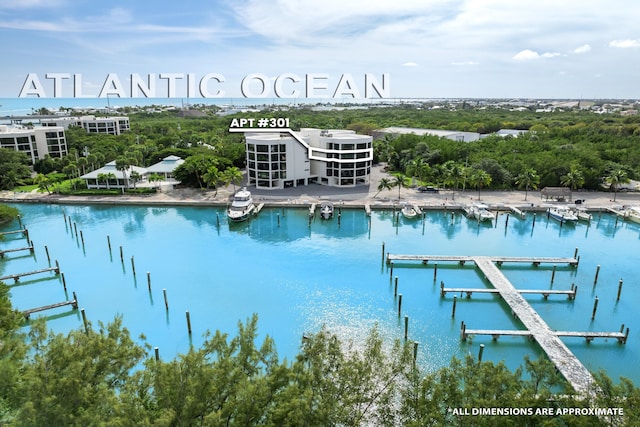 6301 Gulf Of Mexico Blvd Unit 301, Marathon, FL 33050 - view of swimming pool featuring a water view and a boat dock