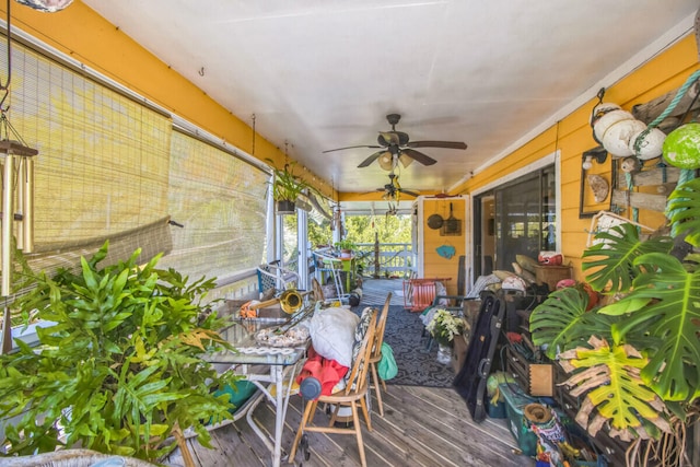 sunroom / solarium with ceiling fan