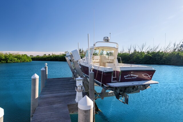 view of dock with a water view