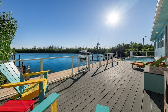 dock area with a water view