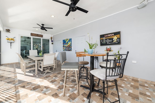 dining room featuring ceiling fan