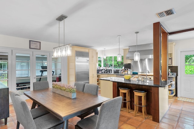 tiled dining space with sink