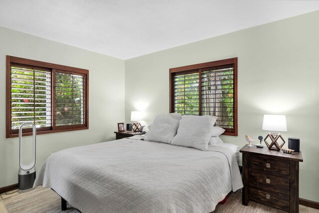 bedroom featuring light hardwood / wood-style floors