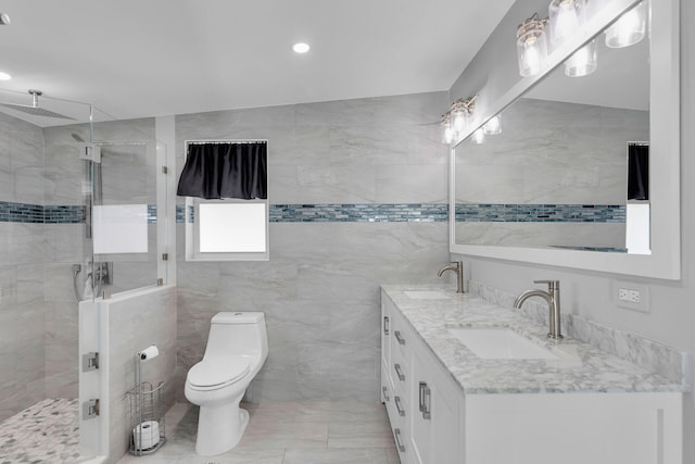 bathroom featuring a shower stall, toilet, double vanity, recessed lighting, and marble finish flooring