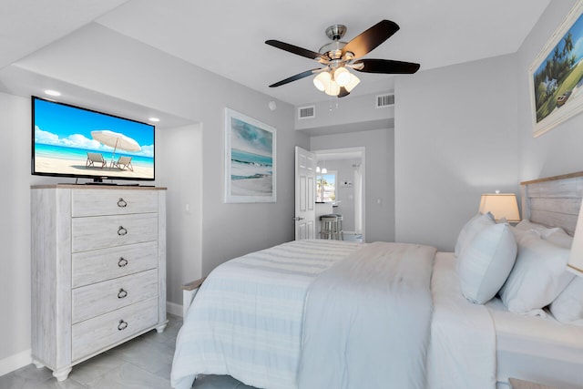 bedroom featuring baseboards, ceiling fan, and recessed lighting