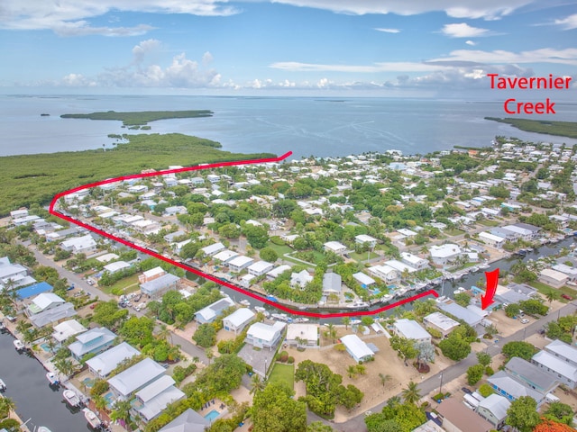 263 Azalea St, Tavernier, FL 33070 - aerial perspective of suburban area featuring a nearby body of water