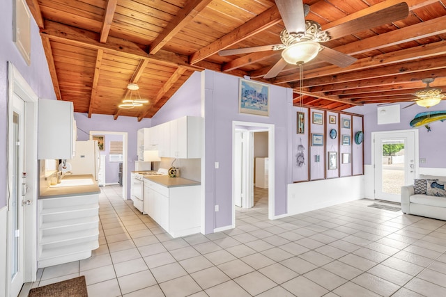 263 Azalea St, Tavernier, FL 33070 - kitchen featuring a wooden ceiling with exposed beams, white appliances, a ceiling fan, light tile patterned floors, and light countertops