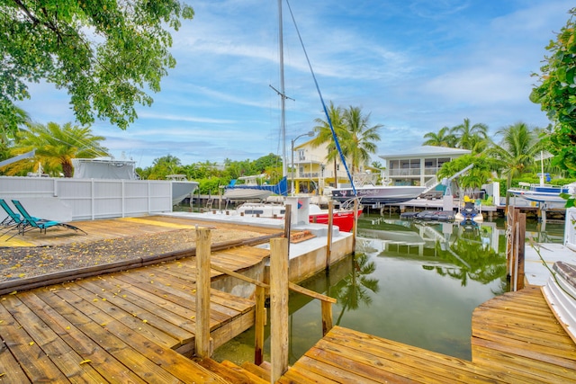 263 Azalea St, Tavernier, FL 33070 - dock featuring a water view and boat lift