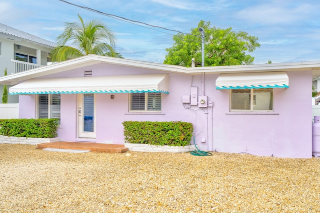 263 Azalea St, Tavernier, FL 33070 - view of front of property with stucco siding