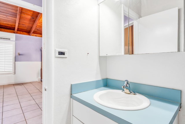 263 Azalea St, Tavernier, FL 33070 - bathroom featuring vanity, a wall mounted air conditioner, wood ceiling, tile patterned flooring, and vaulted ceiling