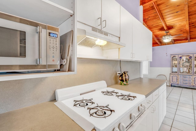 263 Azalea St, Tavernier, FL 33070 - kitchen with white appliances, under cabinet range hood, wooden ceiling, white cabinets, and ceiling fan