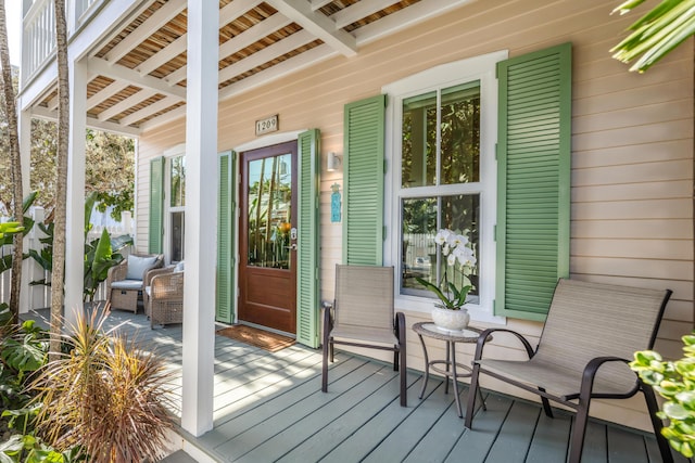 deck with covered porch