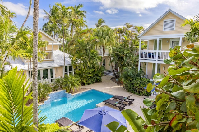 pool featuring a patio area