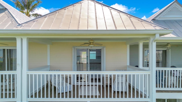 doorway to property with ceiling fan