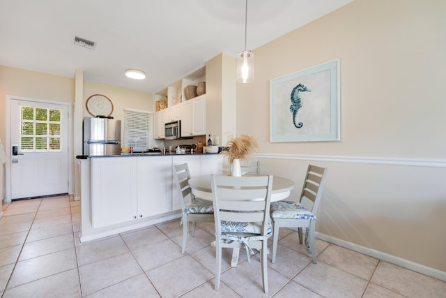 view of tiled dining area