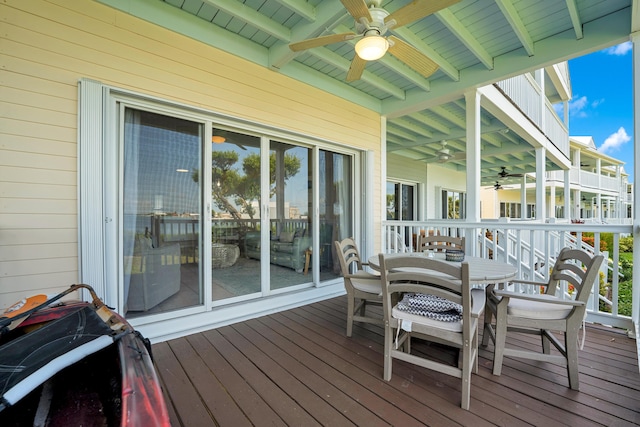 wooden deck with ceiling fan