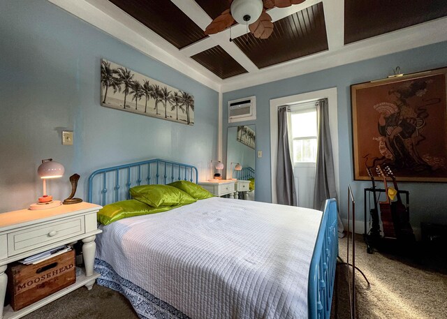 carpeted bedroom with ceiling fan and coffered ceiling