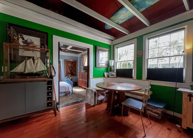 dining space featuring wood-type flooring