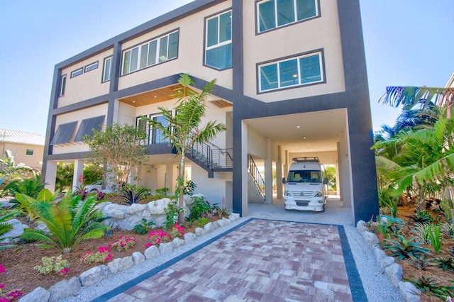 view of front of house with a carport