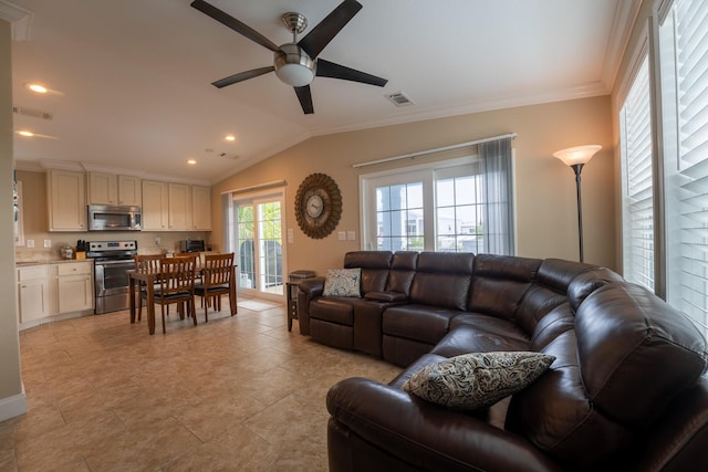 living room with crown molding, ceiling fan, and lofted ceiling