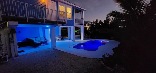 view of pool featuring a patio area