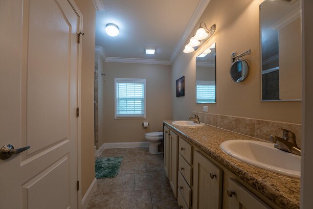 bathroom with ornamental molding, toilet, vanity, and a shower