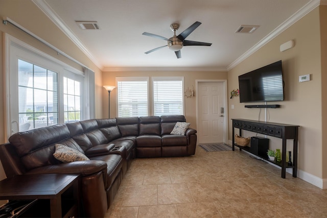 tiled living room featuring ornamental molding and ceiling fan