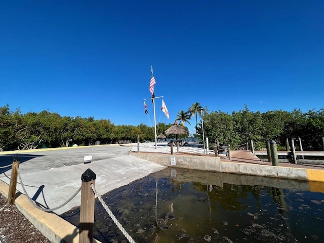 view of home's community with a water view