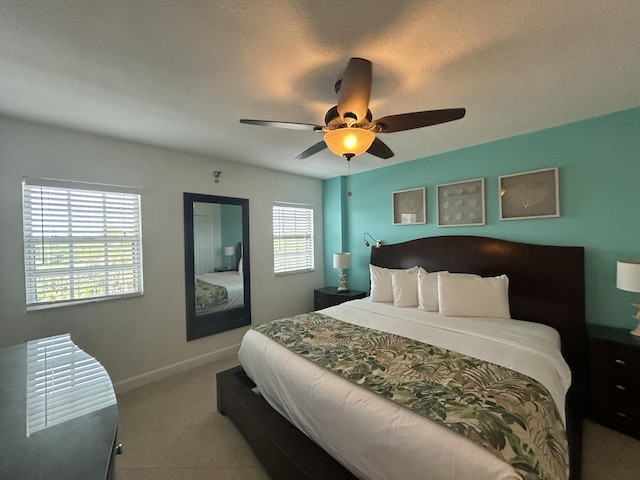 bedroom featuring ceiling fan