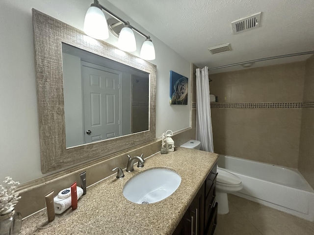 full bathroom with shower / bathtub combination with curtain, tile patterned flooring, vanity, a textured ceiling, and toilet