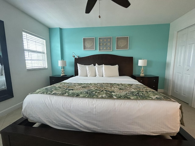 bedroom featuring ceiling fan and a closet