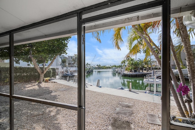 property view of water with a dock