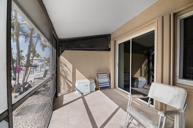 balcony featuring a sunroom