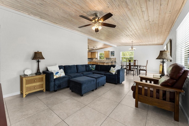 tiled living room featuring ceiling fan, ornamental molding, vaulted ceiling, and wooden ceiling