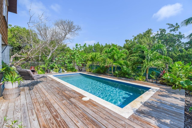 view of pool with a deck