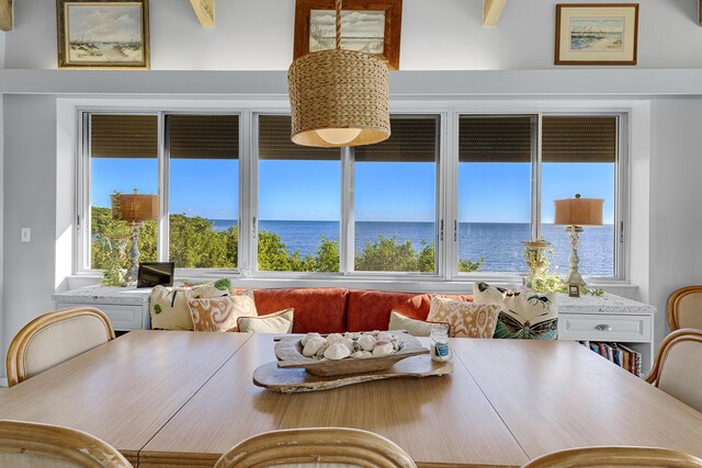 sunroom with a water view