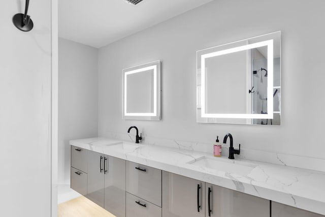 full bathroom with double vanity