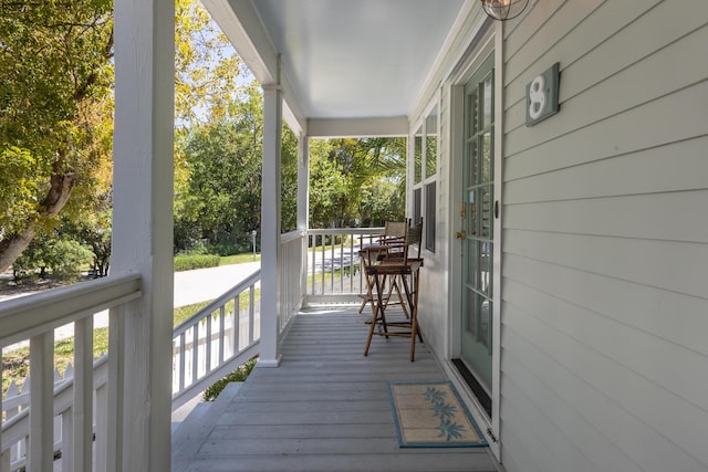 wooden terrace featuring a porch