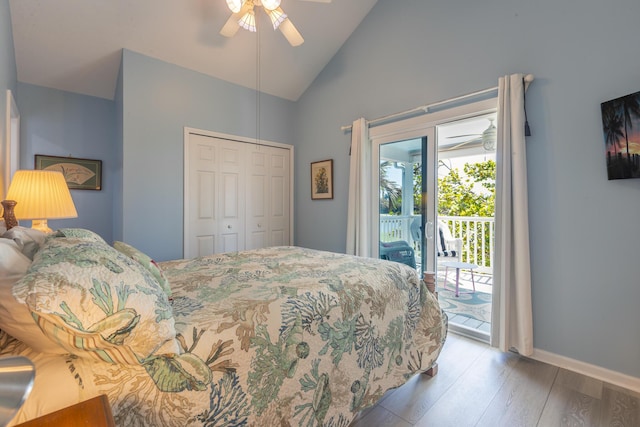 bedroom featuring a ceiling fan, access to outside, wood finished floors, a closet, and baseboards