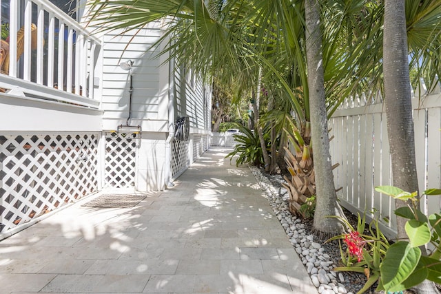 view of patio / terrace featuring fence