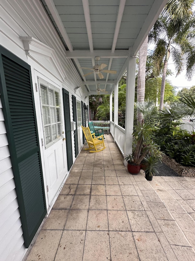 view of patio featuring ceiling fan and covered porch