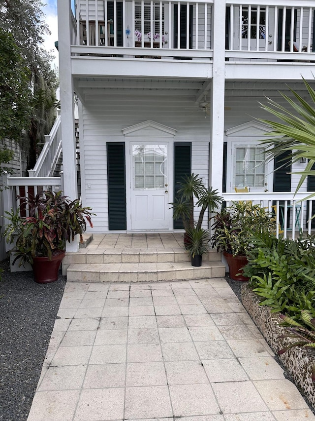 doorway to property featuring a balcony