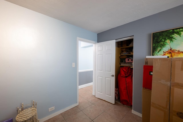 interior space featuring light tile patterned flooring