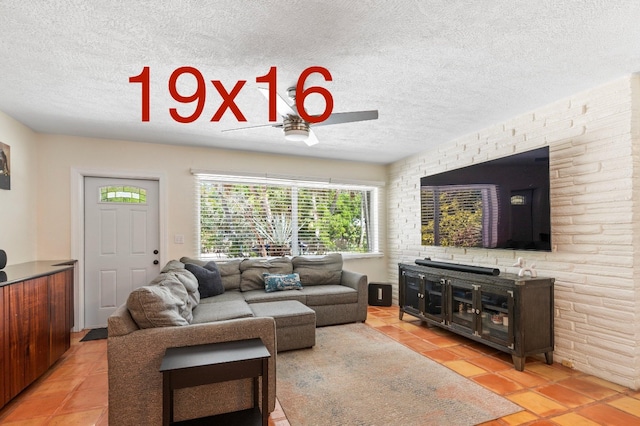 7563 Gulfstream Blvd, Marathon, FL 33050 - living room featuring ceiling fan, a textured ceiling, and light tile patterned flooring