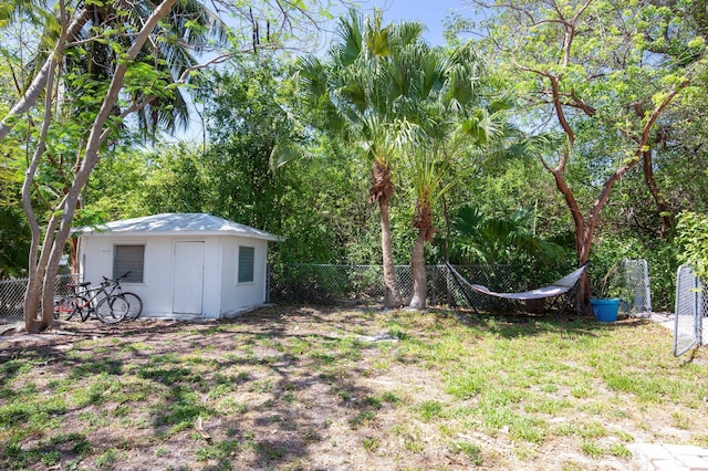 7563 Gulfstream Blvd, Marathon, FL 33050 - fenced backyard featuring an outdoor structure